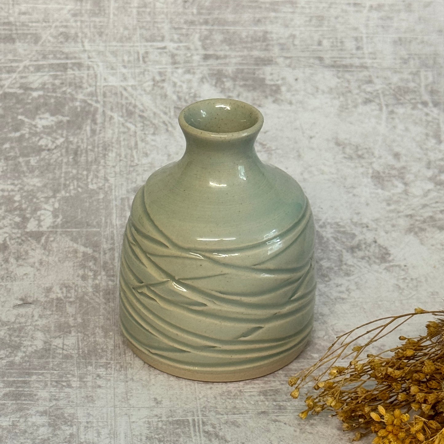 Carved bud vase - Celadon